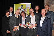 Gruppenfoto der Vortragenden, des Moderators sowie Mitarbeitenden der StädteRegion Aachen.