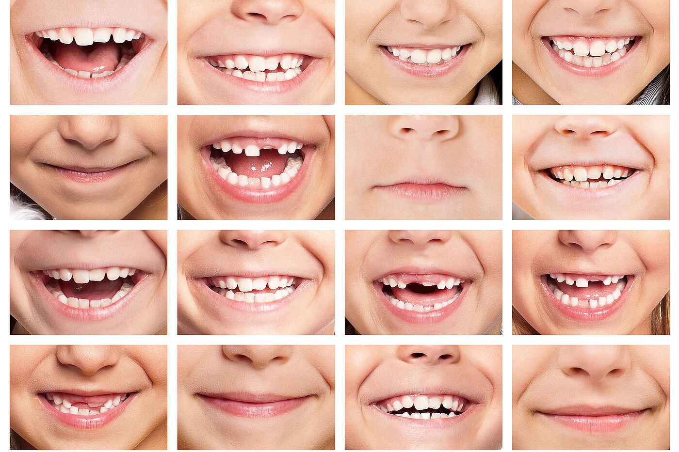 Kinder zeigen Zähne