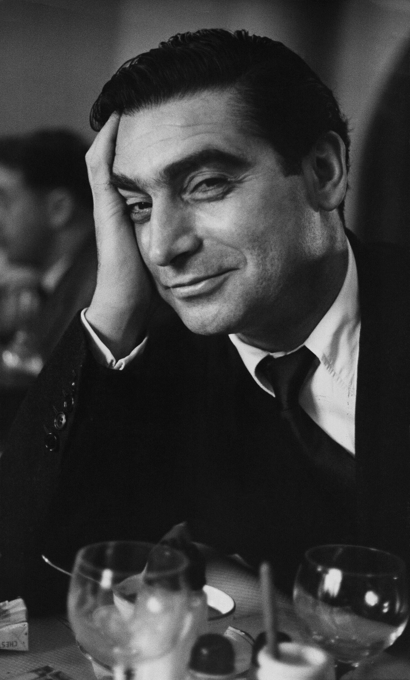 Robert Capa photographed by Ruth Orkin, Paris, France, 1951. 