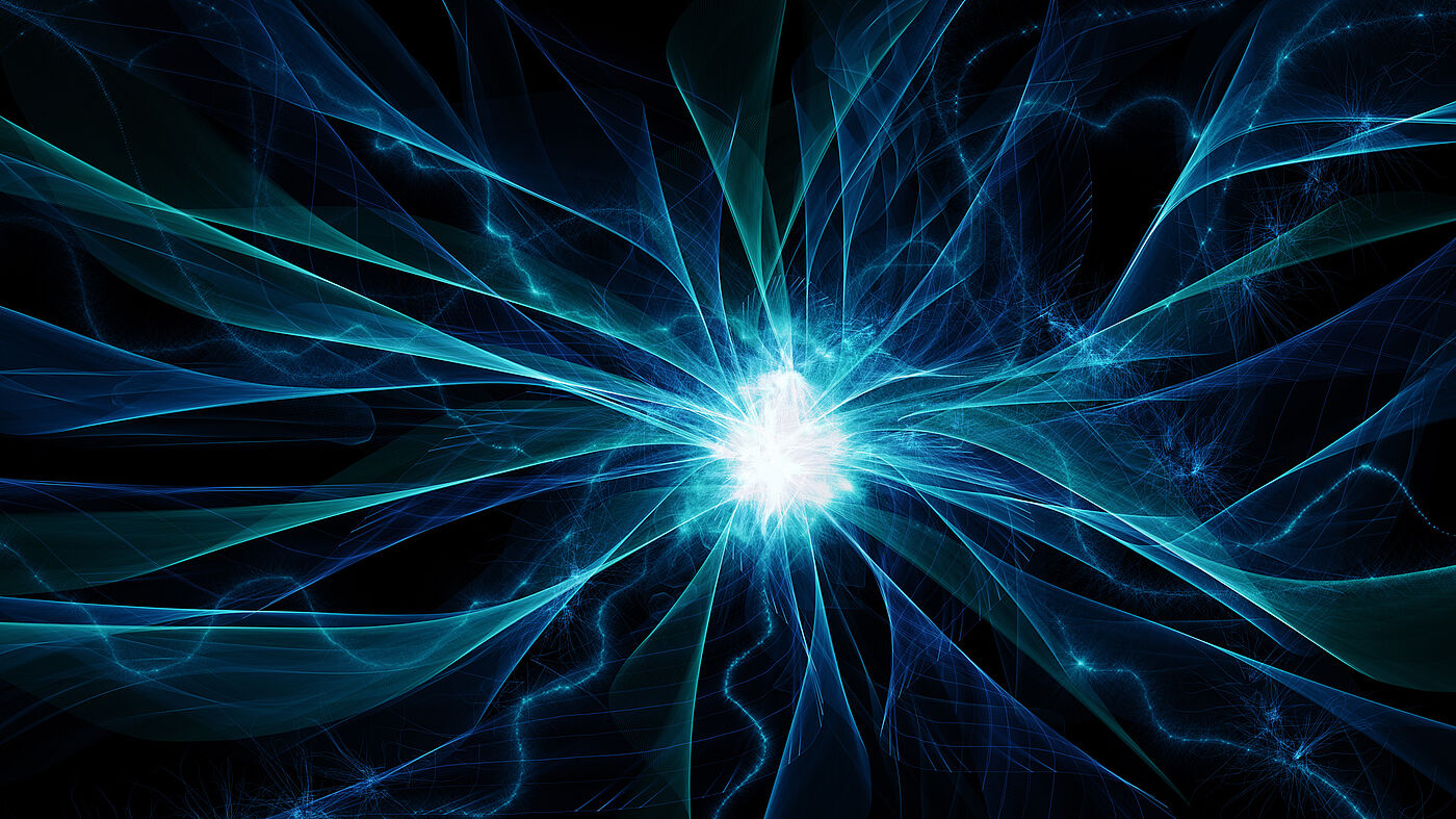 Bildlichtaufname eines Neutrones, Schwarzer Hintergrund und blau, türkis, weiße Lichtkugel mit Farbstrahlen in blau, weiß und türkis