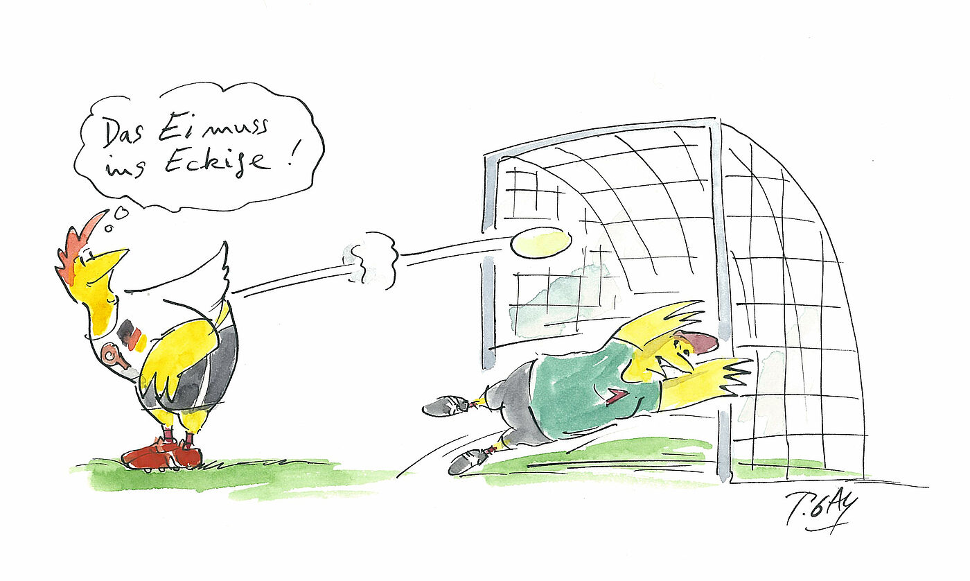 Ein Huhn tritt ein Ei ins Tor